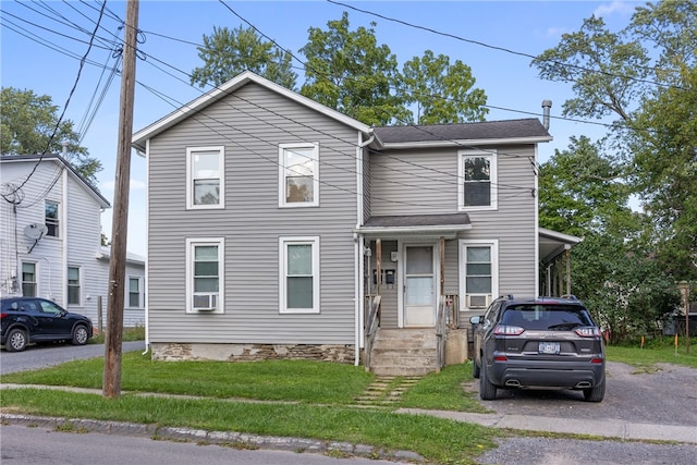 front of property featuring a front yard