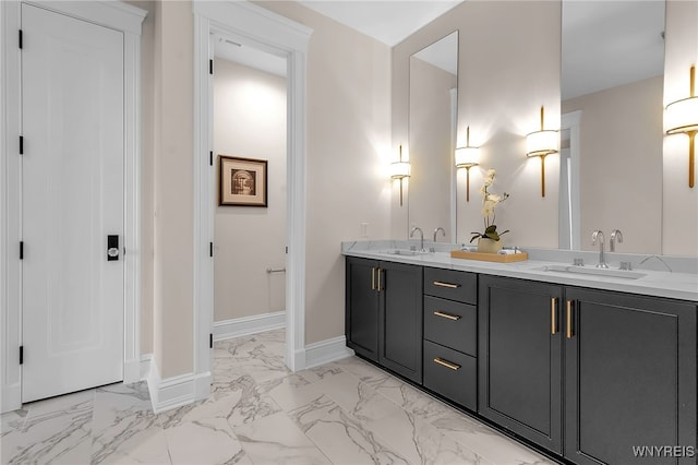 bathroom with tile patterned flooring and vanity