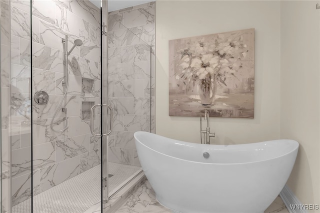 bathroom with tile patterned floors and independent shower and bath