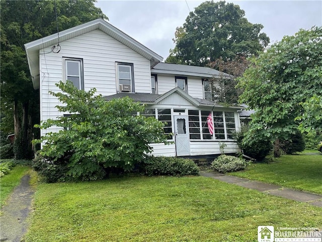 14 E Maple St N, Ellery, NY 14712 - view of front of property featuring a sunroom and a front lawn