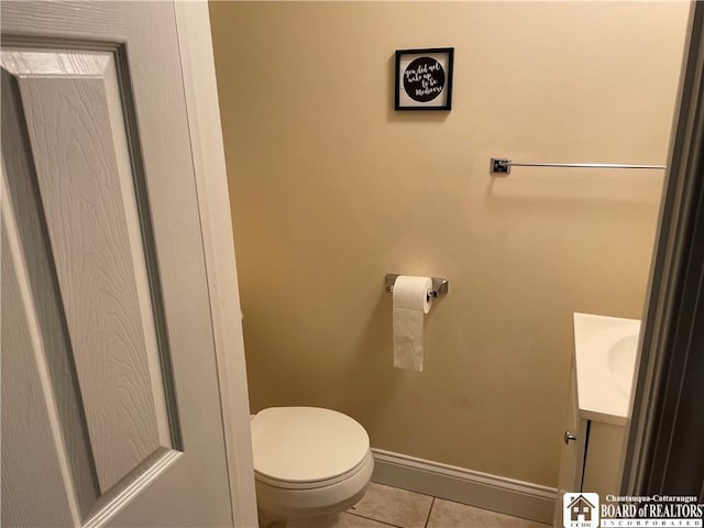 14 E Maple St N, Ellery, NY 14712 - bathroom with tile patterned floors, baseboards, vanity, and toilet