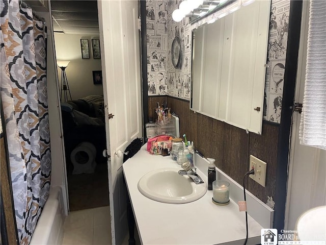 14 E Maple St N, Ellery, NY 14712 - full bath featuring vanity, tile patterned flooring, wainscoting, curtained shower, and wallpapered walls