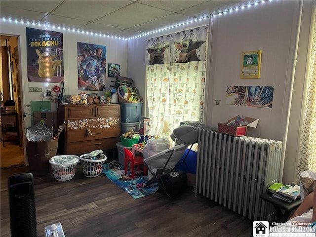 14 E Maple St N, Ellery, NY 14712 - bedroom with wood finished floors, a paneled ceiling, and radiator heating unit