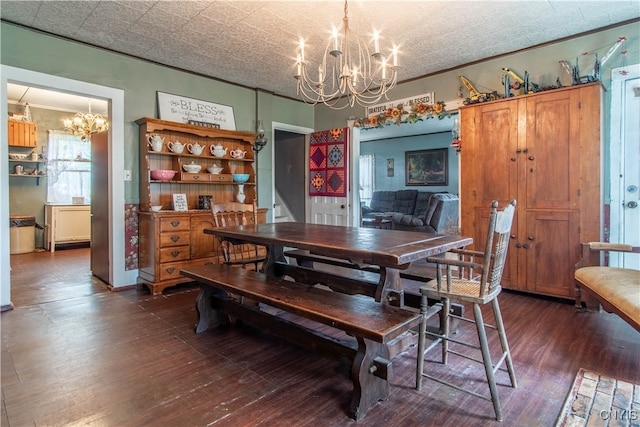 dining room featuring a textured ceiling and dark hardwood / wood-style flooring