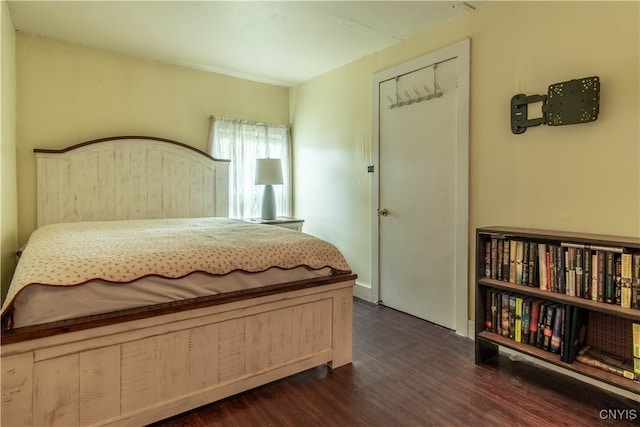 bedroom featuring dark hardwood / wood-style floors