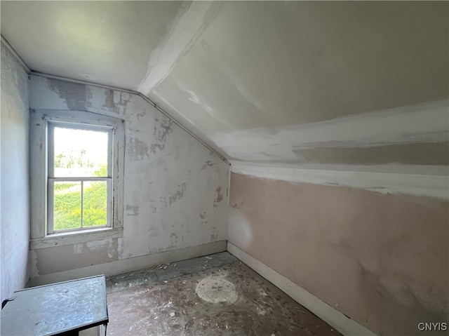 bonus room featuring lofted ceiling