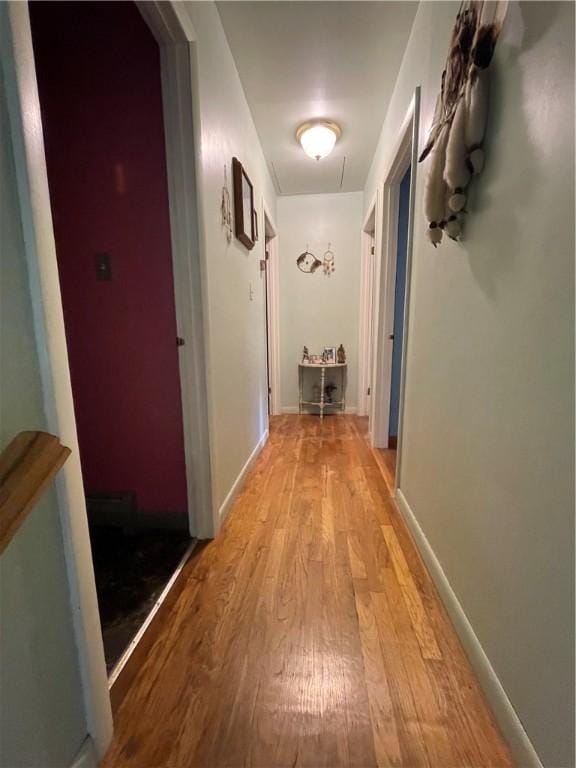 hallway featuring hardwood / wood-style floors