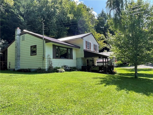 view of home's exterior featuring a lawn