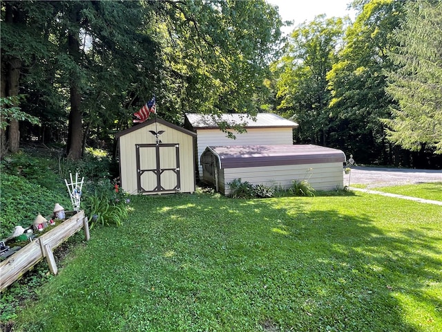 view of outdoor structure featuring a lawn