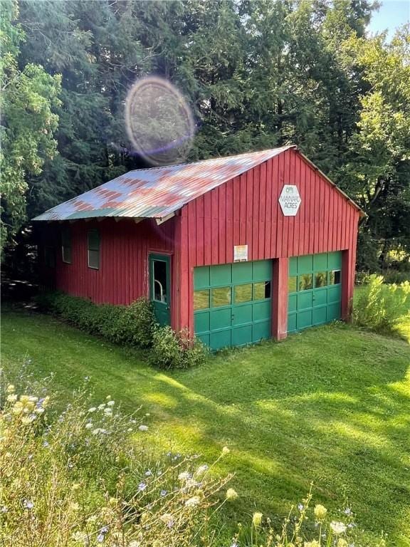 garage with a lawn