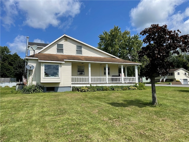 view of front of property with covered porch and a front lawn