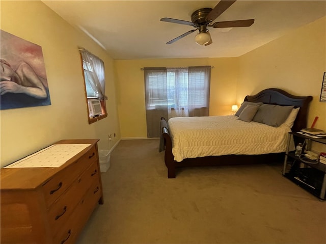 bedroom featuring light colored carpet and ceiling fan