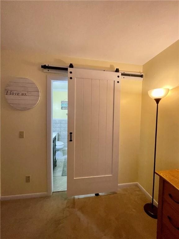 interior space with vanity and toilet