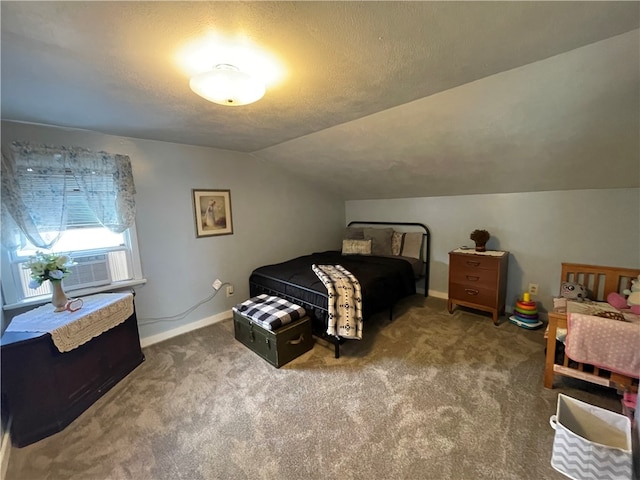 bedroom featuring cooling unit, a textured ceiling, carpet, and vaulted ceiling