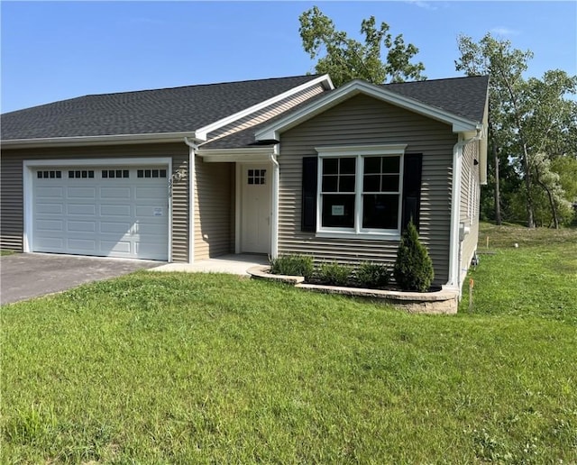 single story home featuring a front yard, a garage, driveway, and a shingled roof