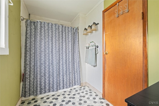 bathroom with crown molding, tile patterned flooring, and a shower with shower curtain