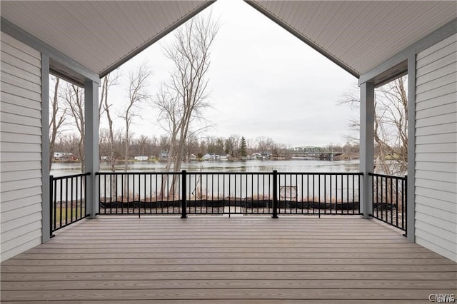 deck with a water view and a porch