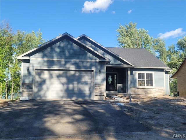 craftsman house with a garage