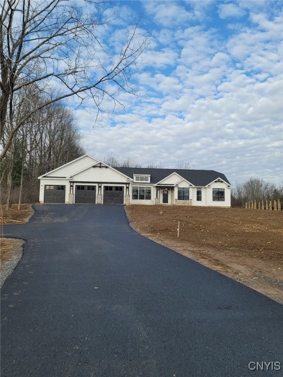 view of front of home with a garage