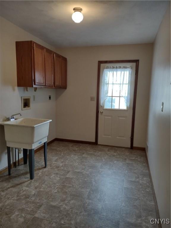 laundry room featuring cabinets, electric dryer hookup, and washer hookup