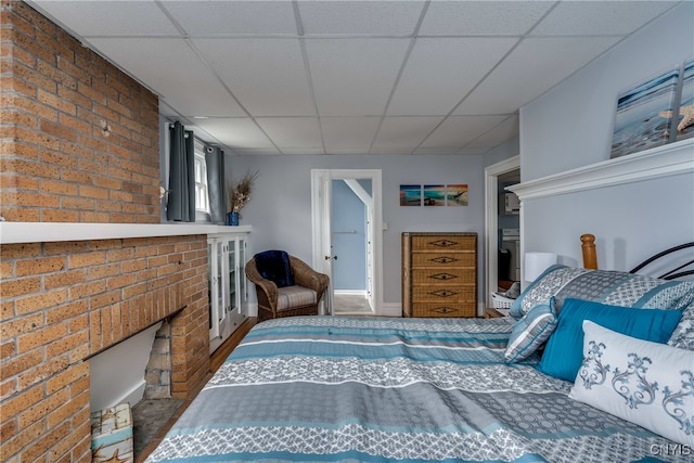 bedroom featuring a drop ceiling