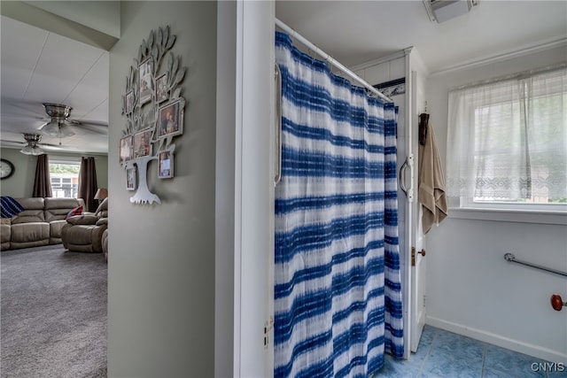 bathroom with ceiling fan