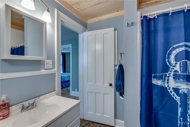 bathroom featuring tile patterned flooring, vanity, wooden ceiling, and a shower with shower curtain