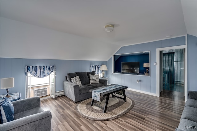 living room with vaulted ceiling and wood-type flooring