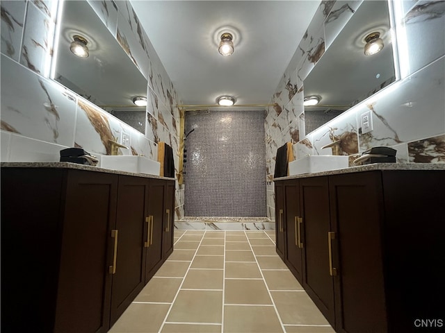 interior space with tile walls, walk in shower, tasteful backsplash, and vanity