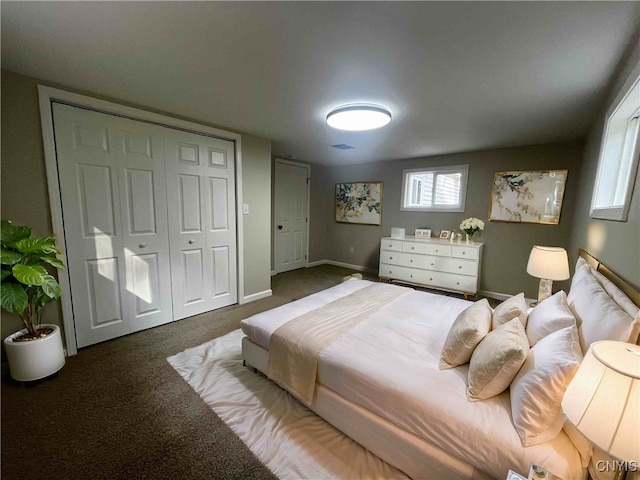 carpeted bedroom with a closet