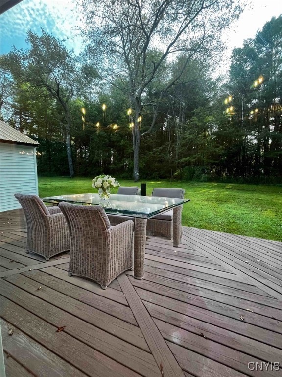 wooden deck with a yard