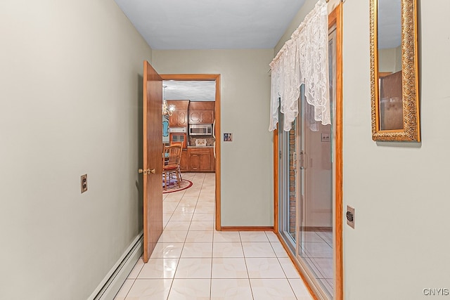 hall with light tile patterned flooring