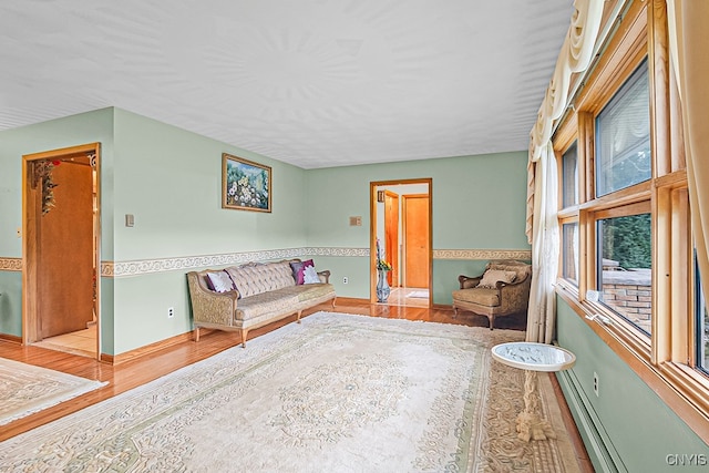 sitting room featuring hardwood / wood-style floors