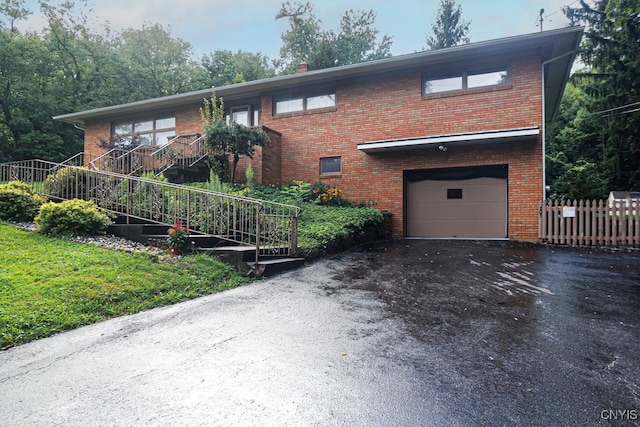 view of front of property featuring a garage