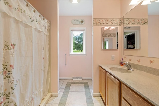 15043 State Route 54th Rd, Wayne, NY 14837 - full bath featuring baseboards, vanity, and tile patterned flooring