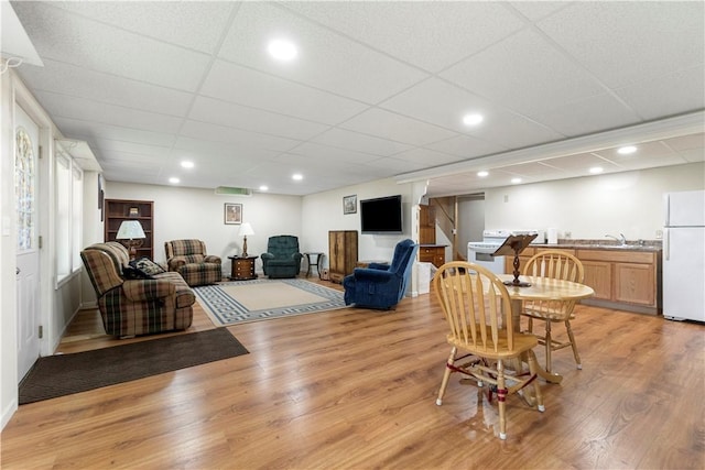 15043 State Route 54th Rd, Wayne, NY 14837 - living room featuring light wood-type flooring, a drop ceiling, and recessed lighting
