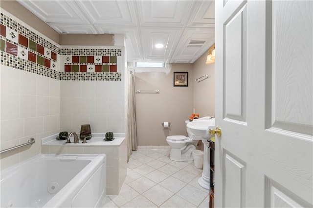 15043 State Route 54th Rd, Wayne, NY 14837 - bathroom featuring a tub, toilet, a sink, tile patterned floors, and recessed lighting