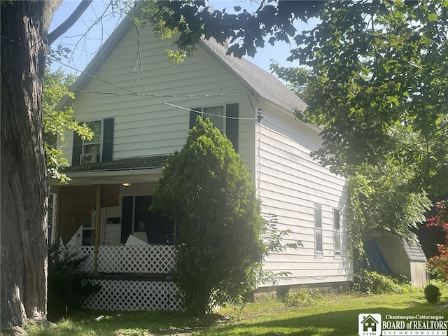 view of home's exterior with a porch