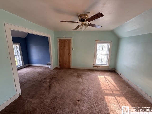 512 N 7th St, Olean-City, NY 14760 - unfurnished room with carpet floors, a ceiling fan, baseboards, and lofted ceiling