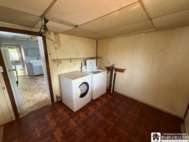 512 N 7th St, Olean-City, NY 14760 - washroom featuring wooden walls, a ceiling fan, laundry area, and washing machine and dryer