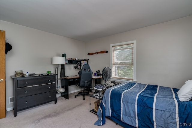 bedroom featuring light colored carpet