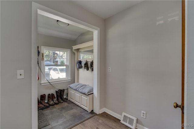 doorway to outside with wood-type flooring