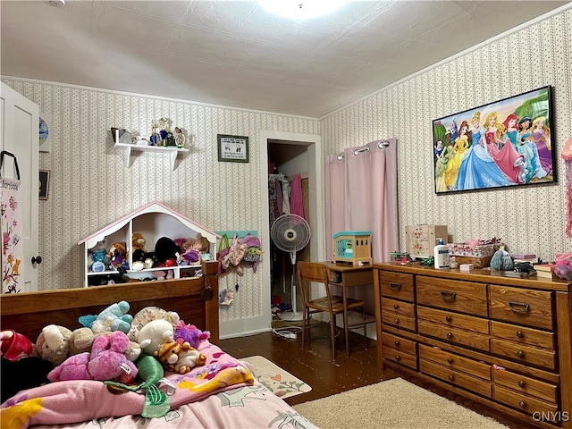 bedroom featuring dark hardwood / wood-style flooring