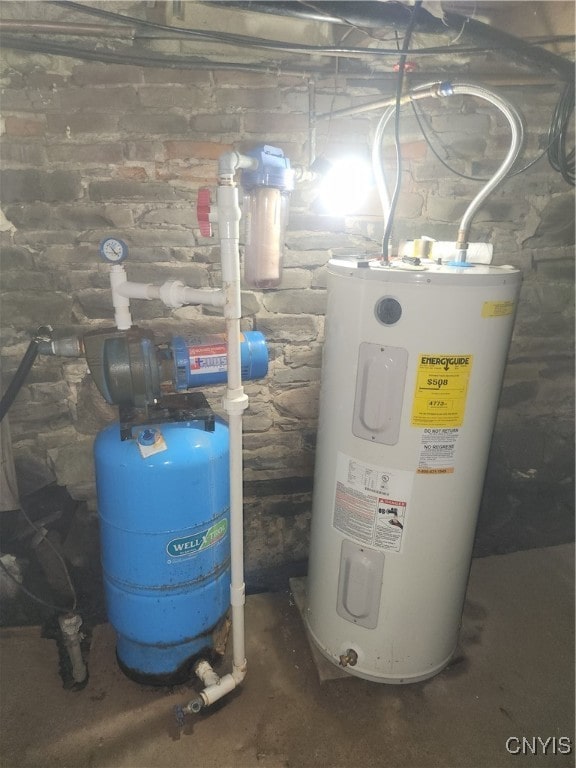 utility room with water heater