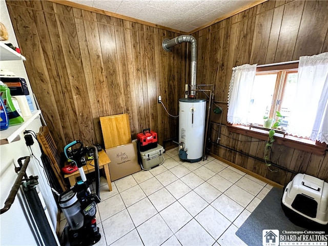 utility room with heating unit and gas water heater