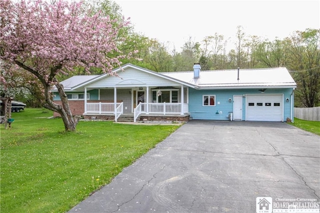 ranch-style home with a garage, a front lawn, and a porch