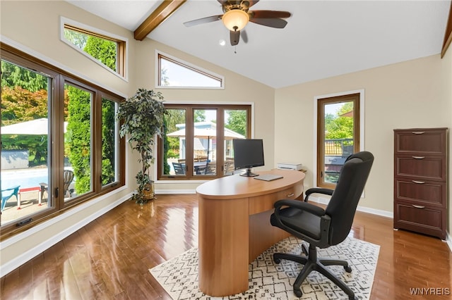 office space with vaulted ceiling with beams, wood-type flooring, plenty of natural light, and ceiling fan