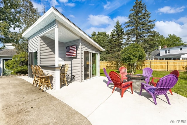 view of patio / terrace featuring a fire pit