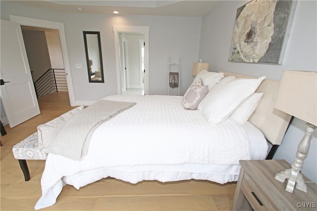 bedroom with light hardwood / wood-style floors