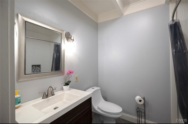 bathroom featuring tile patterned flooring, walk in shower, toilet, and vanity